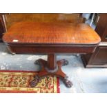 ANTIQUE MAHOGANY FOLD OVER TEA TABLE ON CARVED QUADRAFOIL SUPPORTS