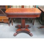 ANTIQUE MAHOGANY FOLD OVER TEA TABLE ON CARVED QUADRAFOIL SUPPORTS