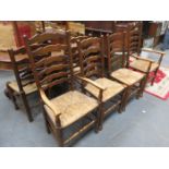 SET OF SIX (FOUR AND TWO) RUSH SEATED LADDER BACK CHAIRS