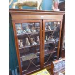 TWO DOOR GLAZED AND MAHOGANY DISPLAY CABINET FITTED WITH TWO DRAWERS BELOW
