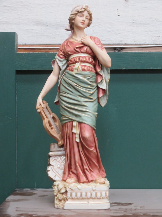 ROYAL DUX BOHEMIA GLAZED AND UNGLAZED FIGURE OF A LADY WITH STRINGED INSTRUMENT, No649,