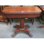 ANTIQUE MAHOGANY FOLD OVER TEA TABLE ON CARVED QUADRAFOIL SUPPORTS