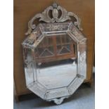 ORNATELY DECORATED SECTIONAL WALL MIRROR,