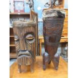 TWO CARVED TRIBAL STYLE TREEN DRUMS