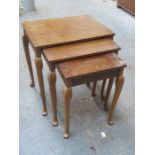 NEST OF THREE TABLES ON CABRIOLE SUPPORTS