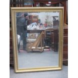 LARGE GILDED AND BEVELLED MIRROR,