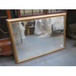 GILDED AND BEVELLED WALL MIRROR,