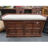 CARVED FRONTED AFRICAN/INDIAN STYLE WINDOW SEAT WITH TWO PANELLED DOORS DECORATED WITH ELEPHANTS