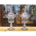 PAIR OF REGENCY GLASS SWEET JARS ON STEMMED SUPPORTS (AT FAULT)