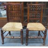 PAIR OF RUSH SEATED COUNTRY STYLE OAK SLAT BACK CHAIRS