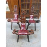 SET OF THREE CARVED AND PIERCE WORK OAK SPINNING CHAIRS WITH OX BLOOD RED LEATHER UPHOLSTERY