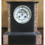 DECORATIVE BLACK SLATE MANTLE CLOCK WITH MARBLE PANEL TO EITHER SIDE AND CIRCULAR ENAMELLED DIAL