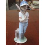 LLADRO COLLECTORS SOCIETY GLAZED CERAMIC FIGURE OF A YOUNG BASEBALL PLAYER,