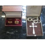 SILVER CROSS ON CHAIN AND GOLD COLOURED CUFFLINKS