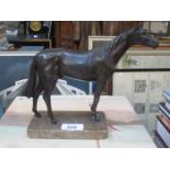 BRONZED METAL MODEL OF HORSE ON MARBLE EFFECT STAND,