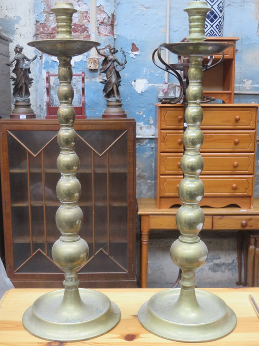 PAIR OF ANTIQUE BRASS TALL CANDLESTICKS,