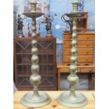 PAIR OF ANTIQUE BRASS TALL CANDLESTICKS,