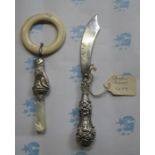 HALLMARKED SILVER IVORY AND MOTHER OF PEARL TEETHING RING PLUS SILVER HANDLED KNIFE