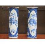 PAIR OF ORIENTAL BLUE AND WHITE CERAMICS SLEEVE VASES (ONE AT FAULT),