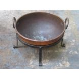 VICTORIAN COPPER TWO HANDLED BOWL ON CAST IRON STAND