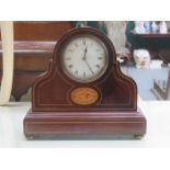 MAHOGANY STRING AND SHELL INLAID MANTLE CLOCK WITH CIRCULAR ENAMELLED DIAL,