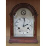 GUSTAV BECKER MAHOGANY CASED BRACKET CLOCK WITH SILVER COLOURED CIRCULAR DIAL