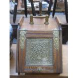 VICTORIAN OAK COAL SCUTTLE WITH RELIEF DECORATED BRASS MOUNTS AND HINGES