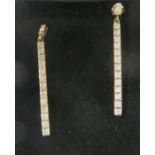 PAIR OF DIAMOND AND GOLD LONG DROP EARRINGS