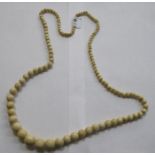 STRING OF IVORY BEADS