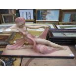 S MELANI DEPOSE PLASTER SCULPTURE OF RECLINING FIGURE AND SWAN,