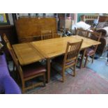 ARTS & CRAFTS STYLE OAK DRAW LEAF DINING TABLE AND SIX CHAIRS