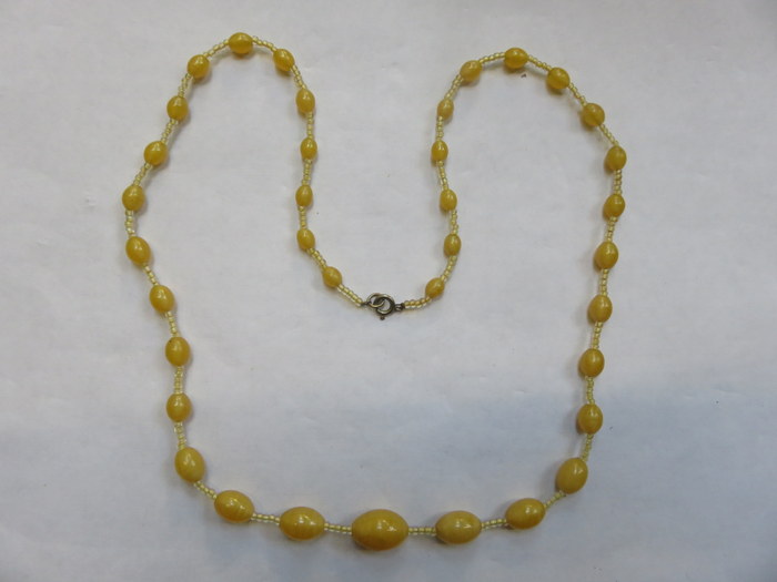 STRAND OF AMBER BEADS