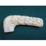19th CENTURY HEAVILY CARVED ORIENTAL WALKING STICK IVORY HANDLE DECORATED WITH FACES,