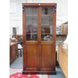 VICTORIAN MAHOGANY TWO DOOR GLAZED BOOKCASE WITH TWO CUPBOARDS BELOW