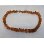 STRAND OF AMBER BEADS