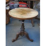 WALNUT CIRCULAR TABLE ON CARVED TRIPOD SUPPORTS