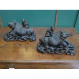 PAIR OF ORIENTAL CARVED HARDWOOD WATER BUFFALO FIGURES,