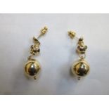 PAIR OF UNHALLMARKED GOLD COLOURED SPHERICAL DROP EARRINGS