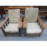 PAIR OF OAK RECLINING ARMCHAIRS