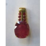 18k GOLD PENDANT SET WITH ROYAL RUBY & OTHER RUBY STONES