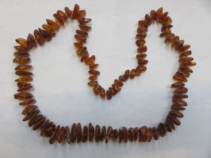 STRAND OF AMBER BEADS