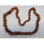 STRAND OF AMBER BEADS