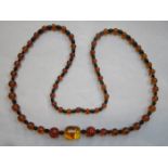 STRAND OF AMBER BEADS