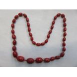 STRAND OF GRADUATED BEADS