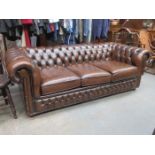 20th CENTURY BROWN BUTTON BACK CHESTERFIELD THREE SEATER SETTEE