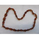 STRAND OF AMBER BEADS