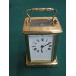 BRASS AND GLASS FRENCH CARRIAGE CLOCK WITH ENAMELLED DIAL