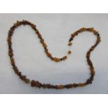 STRAND OF AMBER BEADS