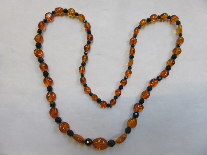 STRAND OF AMBER BEADS