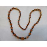 STRAND OF AMBER BEADS